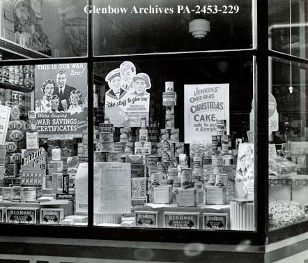 © “Jenkins’ Groceteria ca 1941-1945, Calgary, Alberta,” Glenbow Archives, PA-2453-22936, Archives and Special Collections, University of Calgary.